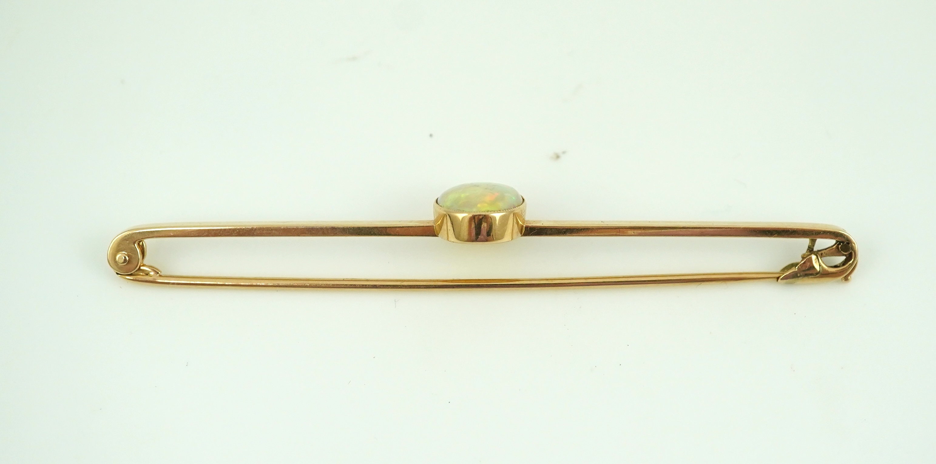 An Edwardian gold and opal brooch, early 20th century